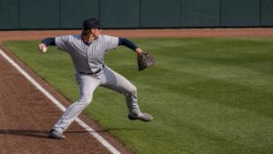 Corner outfielder preparing to throw from near the outfield line